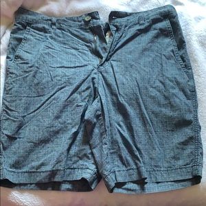 Blue patterned shorts.